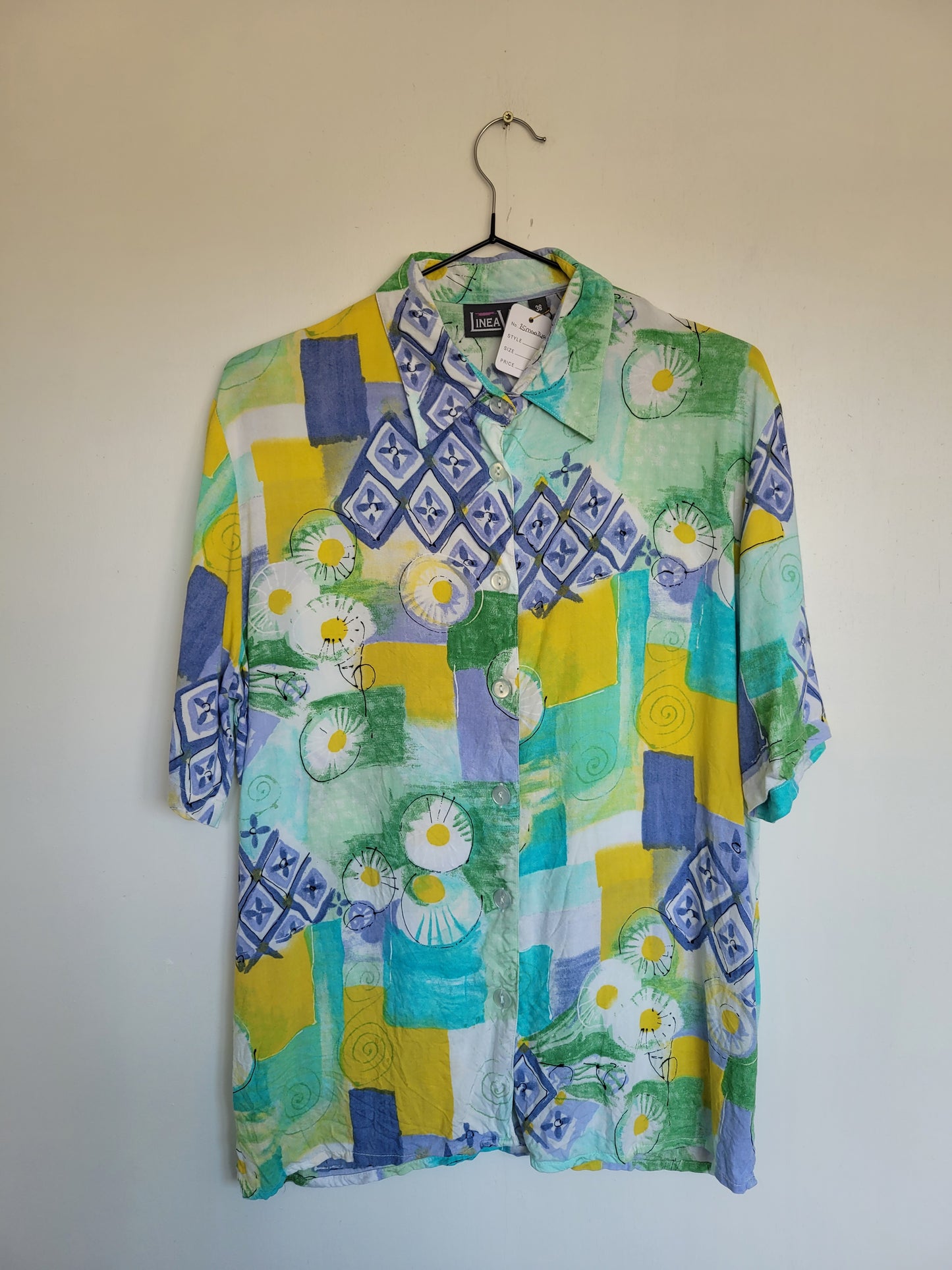 Feeling Groovy - vintage blouse met abstract bloemen patroon - maat M