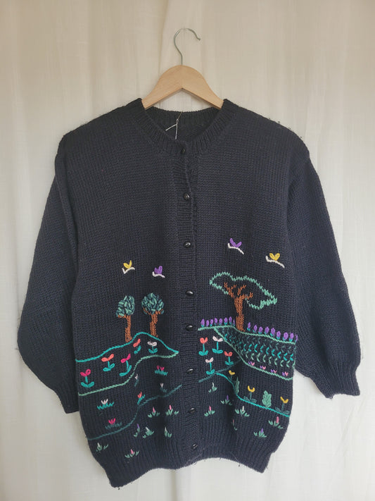 📖 Storybook Village - vintage knitted cardigan with colorful village details - size M