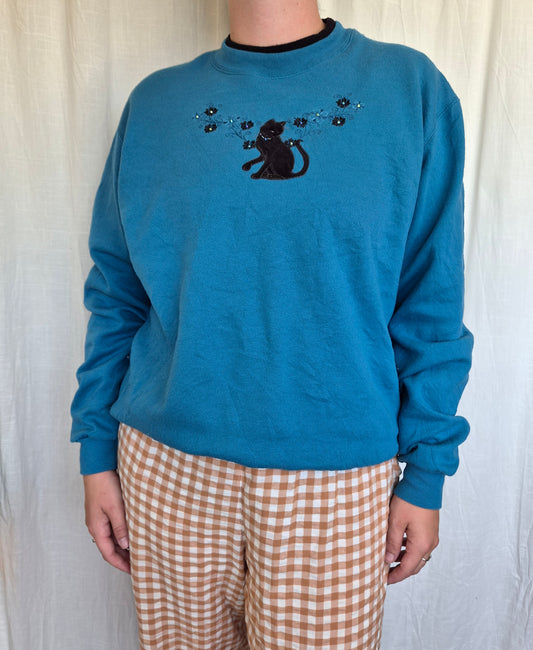 🐈‍⬛ Nine Lives & Wildflowers - vintage blue crewneck sweater with embroidered black cat (Perfectly Imperfect) - size L