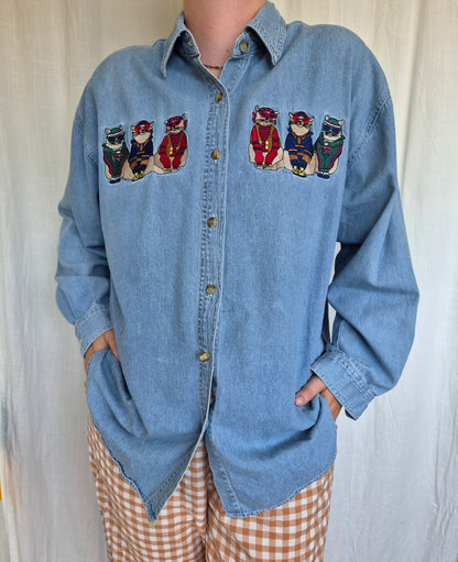 🐾 The Neighbourhood Trendsetters - vintage light blue denim shirt with embroidered cats in clothes - size XL/XXL