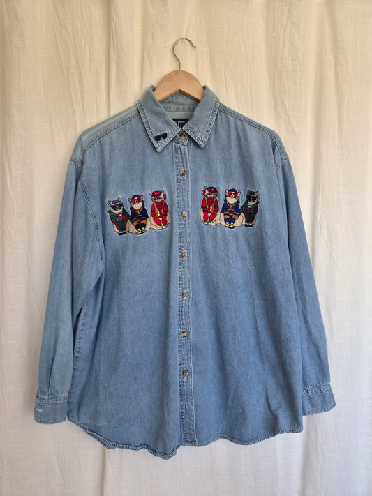 🐾 The Neighbourhood Trendsetters - vintage light blue denim shirt with embroidered cats in clothes - size XL/XXL