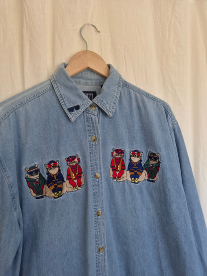🐾 The Neighbourhood Trendsetters - vintage light blue denim shirt with embroidered cats in clothes - size XL/XXL