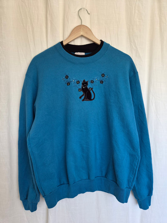 🐈‍⬛ Nine Lives & Wildflowers - vintage blue crewneck sweater with embroidered black cat (Perfectly Imperfect) - size L