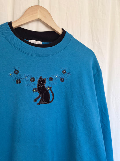 🐈‍⬛ Nine Lives & Wildflowers - vintage blue crewneck sweater with embroidered black cat (Perfectly Imperfect) - size L
