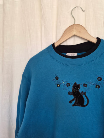 🐈‍⬛ Nine Lives & Wildflowers - vintage blue crewneck sweater with embroidered black cat (Perfectly Imperfect) - size L