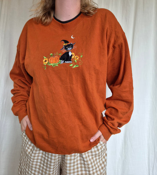 🐈‍⬛ The Witch's Little Familiar - vintage rusty orange crewneck sweater with black witchy cat - size L/XL
