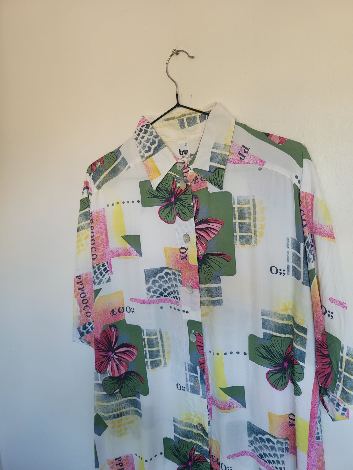 Funky and Free - vintage blouse met vlakken en bloemen patronen - maat L