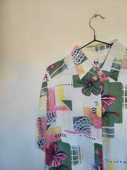 Funky and Free - vintage blouse met vlakken en bloemen patronen - maat L