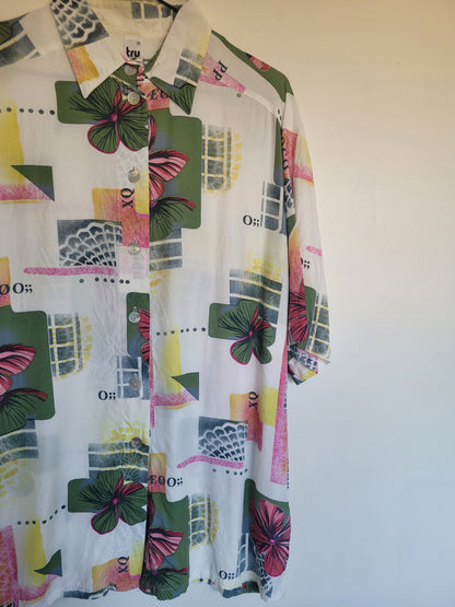 Funky and Free - vintage blouse met vlakken en bloemen patronen - maat L
